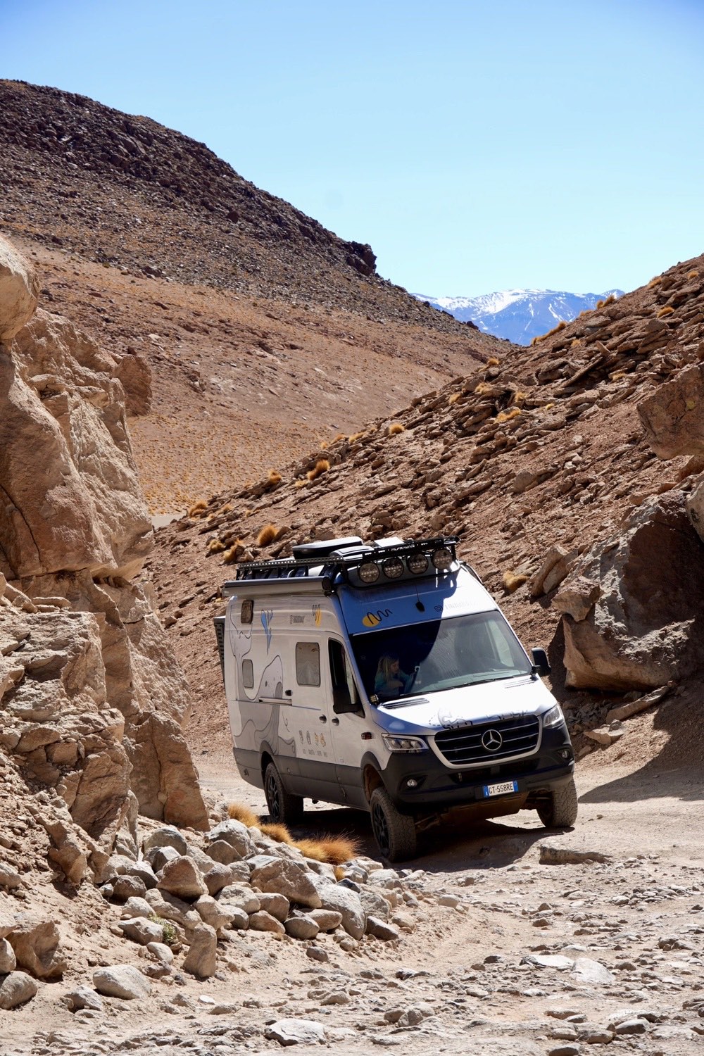 Finn, a Mercedes Sprinter and Weft's reference vehicle, on a mountain track in the Andes